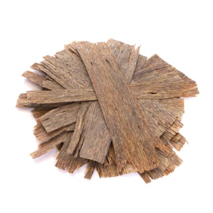 Vitnami Slices Under Water 25: A close-up of a pile of brown, textured slices arranged in a decorative fan shape.